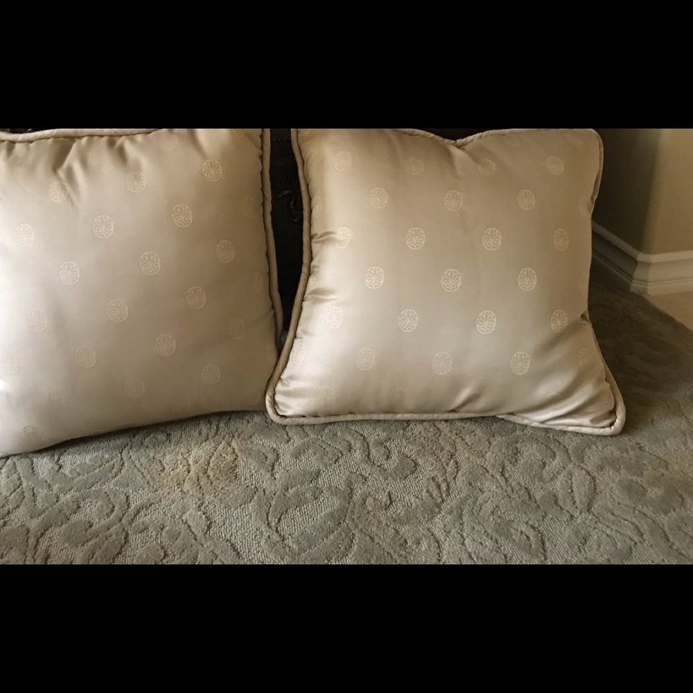 Two silk decorative pillows with motif